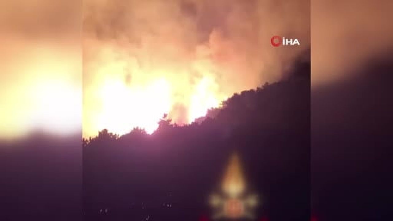 İtalya'nın ünlü Garda Gölü yakınlarındaki çıkan orman yangını nedeniyle aralarında turistlerin de...