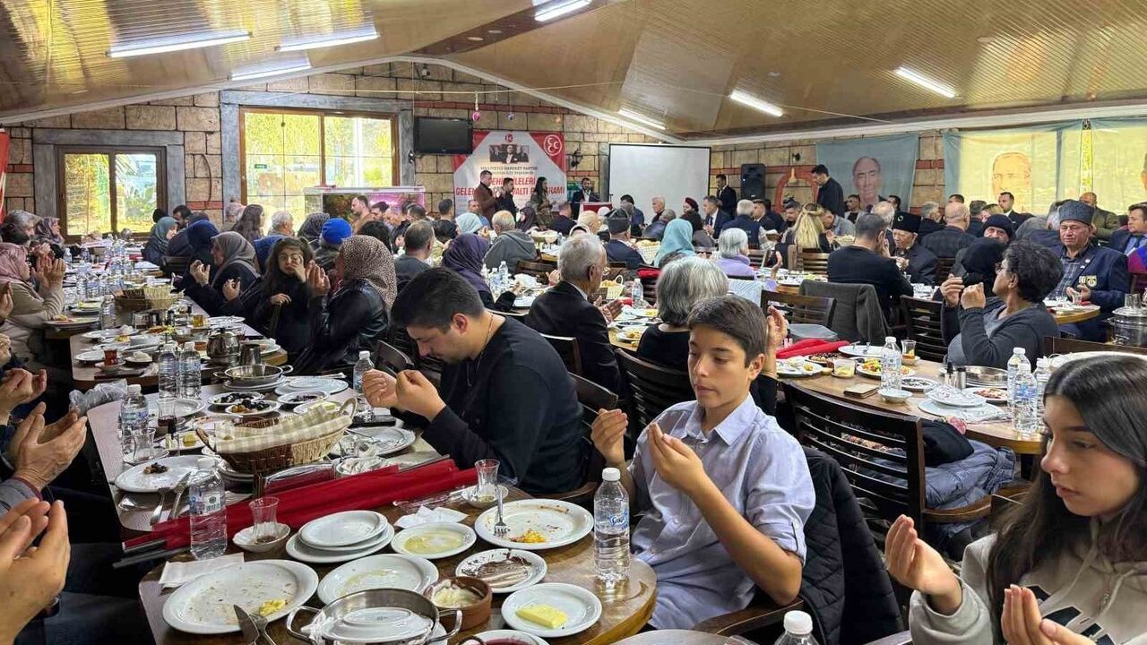 MHP Kemalpaşa'da Şehit Aileleri ve Gazilerle Anlamlı Buluşma