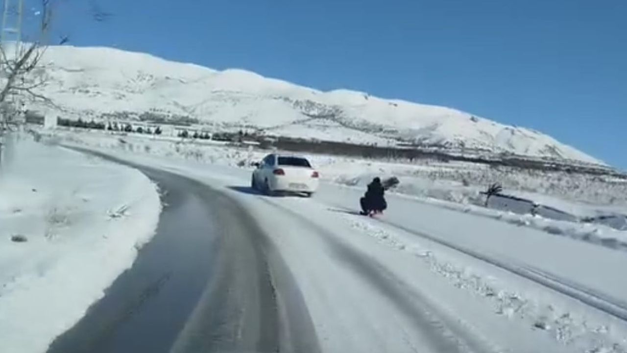 Elazığ'da Tehlikeli Eğlence: Araçla Kızağı Metrelerce Çekti