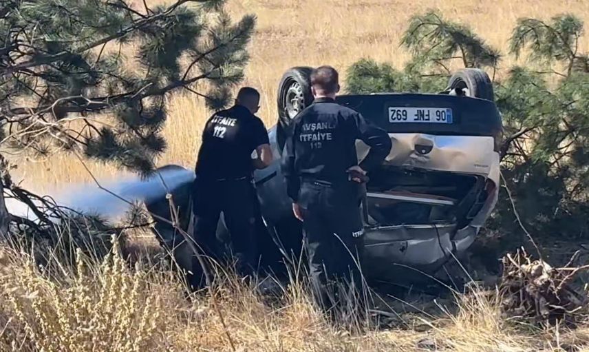 Tavşanlı’da şarampolde 70 metre sürüklenen otomobil takla attı, sürücü yara almadan çıktı
