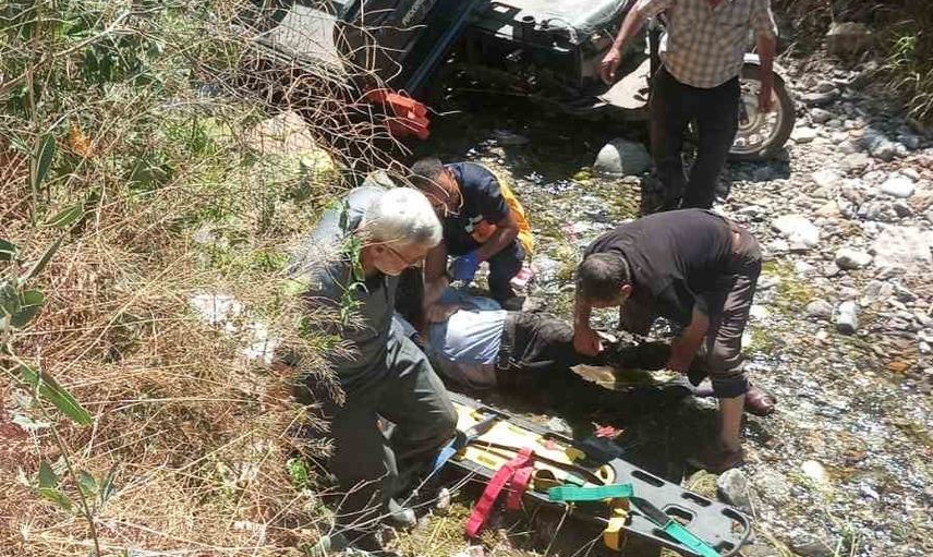 Kazada dere yatağına devrilen üç tekerlekli motosiklette dede yaşamını yitirdi