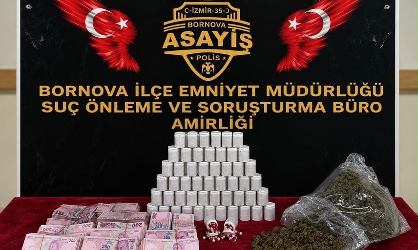 Bornova'da ev baskınında binlerce uyuşturucu hap ve esrar ele geçirildi