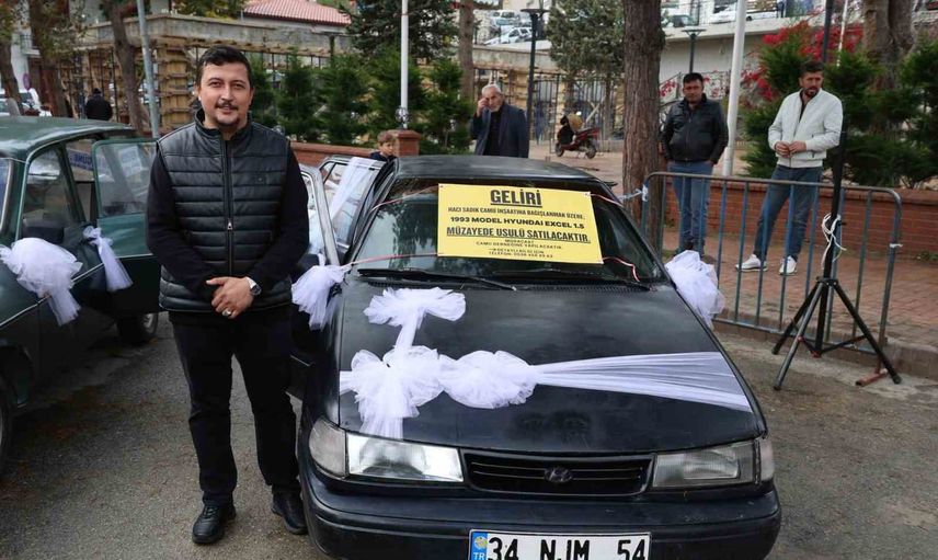 Gerede'de hayır müzayedesinde iki otomobil cami inşaatına 410 bin lira sağladı