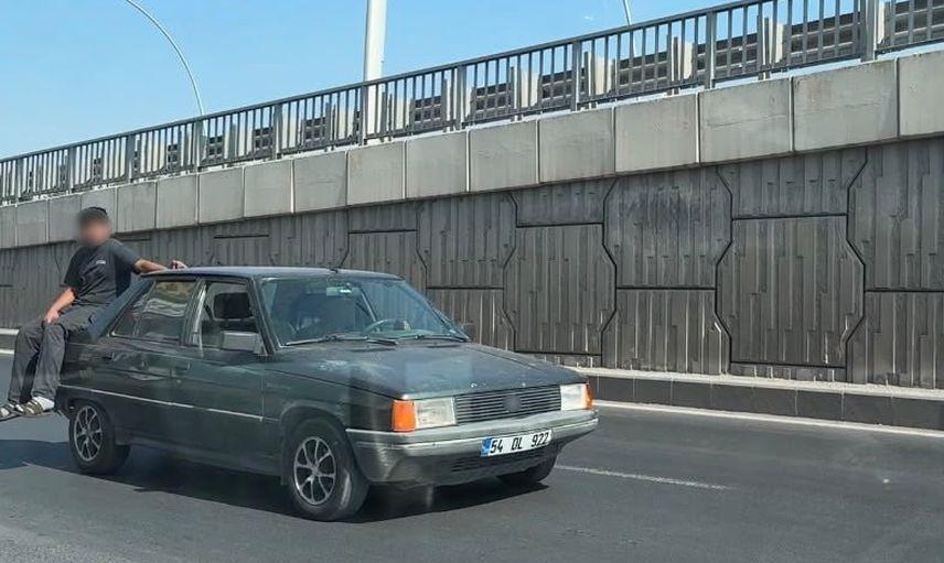 Diyarbakır'da tehlikeli yolculuklar kamerada: bagajda oturan çocuk ve bagaja binen kişi kaydedildi
