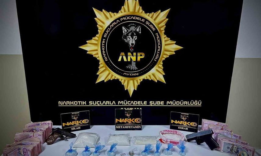 Germencik'te bin 137 gram metamfetamin ile silah ve nakit ele geçirildi