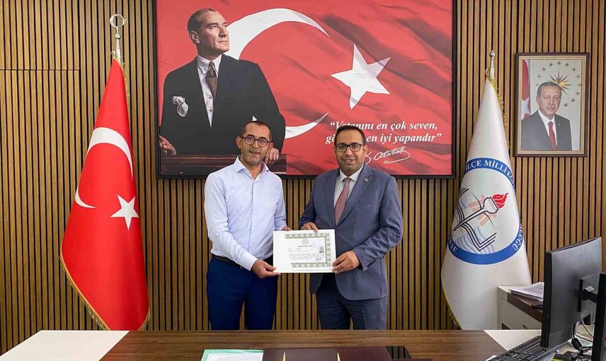 Menteşe'de eğitim yöneticilerine başarı belgeleri takdim edildi
