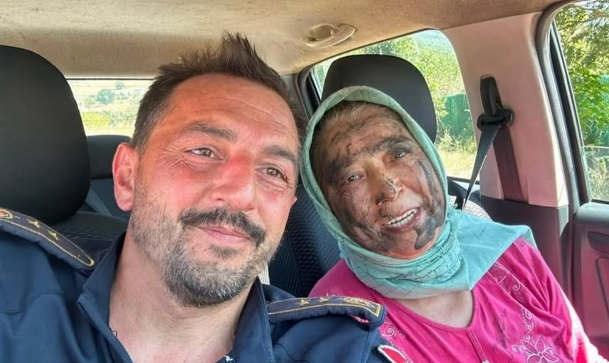 Köyünü korumak için hastalığını unutan teyze alevlerin önüne geçti