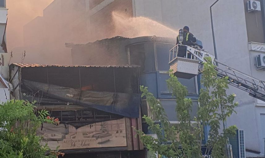 Germencik'te hızlı müdahale hasarı sınırladı, başkan Zencirci mağazayı inceledi