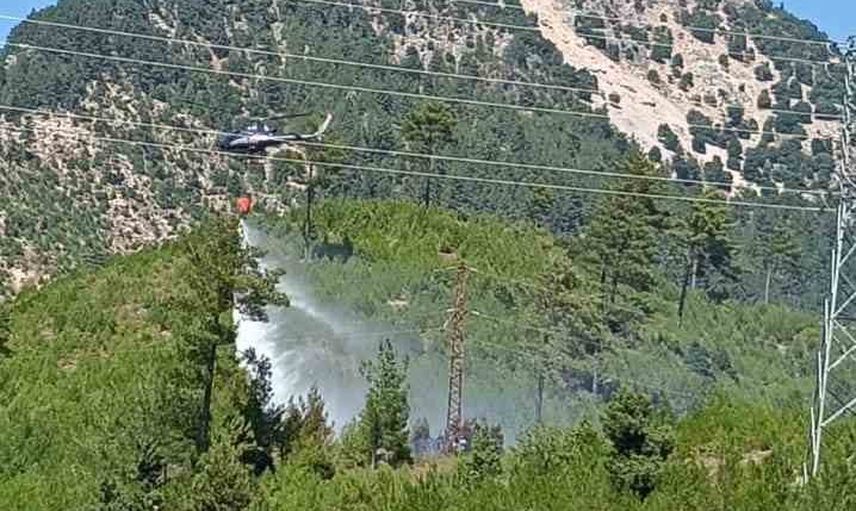 Adana Feke'de ormanlık alanda yangın, 1 helikopter ve arazözlerle müdahale ediliyor