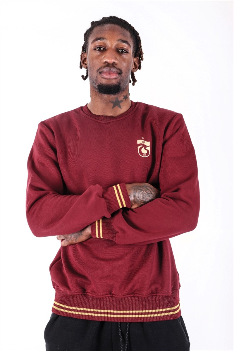 Trabzonspor'un Avusturyalı orta saha oyuncusu Muhammed Cham, Trabzonspor Dergisi'ndeki...