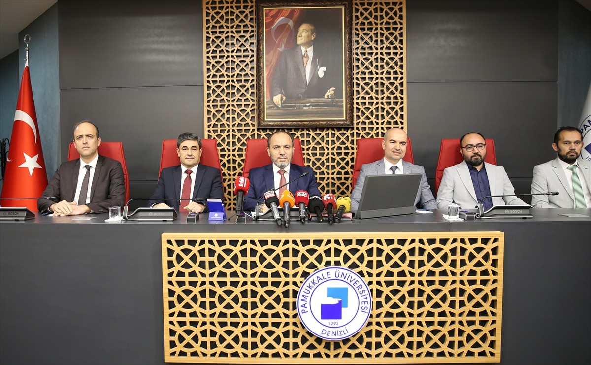 Pamukkale Üniversitesi (PAÜ) Rektörü Prof. Dr. Mahmud Güngör (sol 3), rektörlük binasındaki...