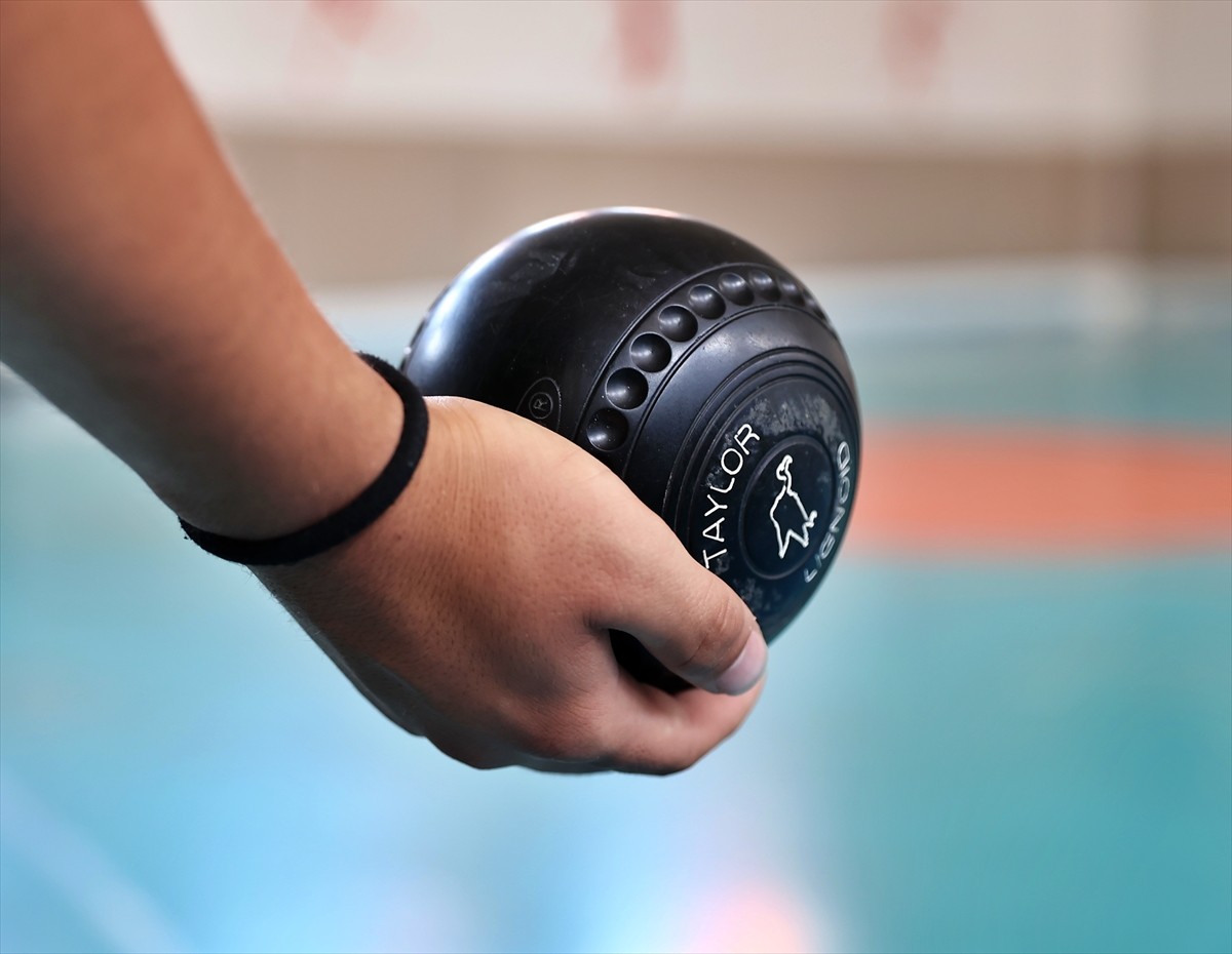 Çim Topu Milli Takımı'nda yer almaya hak kazanan Yusuf Emre Boyun (solda) ve Umut Can İleri (sağ...