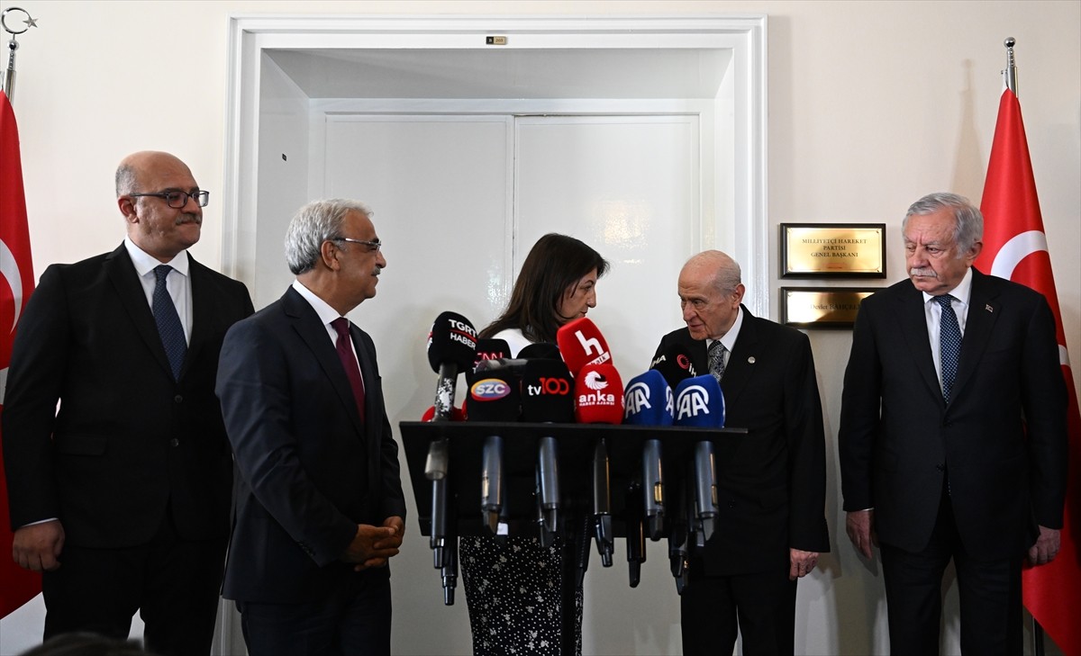 MHP Genel Başkanı Devlet Bahçeli (sağ 2), TBMM Başkanvekili ve DEM Parti Van Milletvekili Pervin...